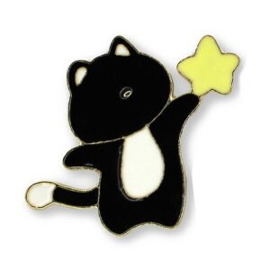 Black and white cat enamel pin reaching up to touch a yellow star with gold-toned plating.