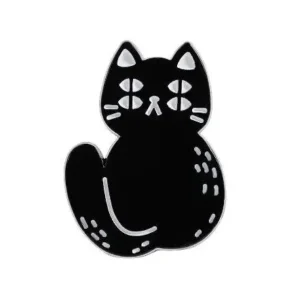 A black cat enamel pin with silver trim, featuring four white eyes and white whisker details in a mystical, flat art style.