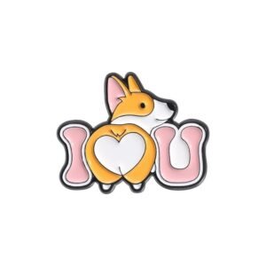 A cute enamel pin featuring a Pembroke Welsh Corgi from behind, its white fur patch forming a heart shape, positioned between the letters I and U to spell I Love You.