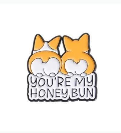 Corgi honey bun pin with a high-quality enamel finish and funny dog-themed pun.