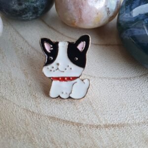 Black and white French Bulldog puppy enamel pin with a red studded collar and pink inner ears.