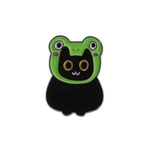 A cute black cat enamel pin wearing a bright green frog-shaped hoodie with pink cheek details.