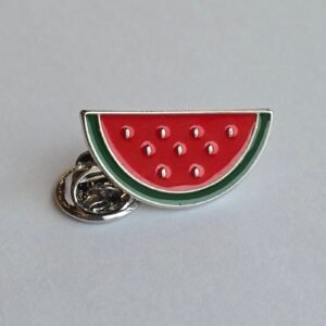 Watermelon slice enamel pin featuring vibrant red and green enamel with a silver butterfly clutch.