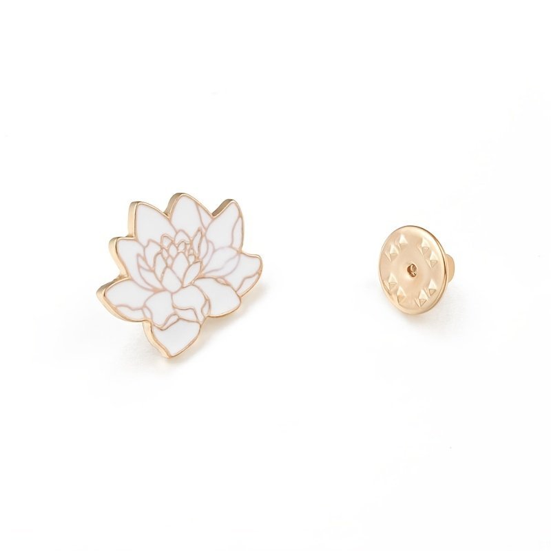 White lotus flower pin with gold-plated outlines and a secure gold-toned metal clutch.