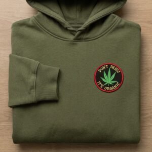 Don't Panic It's Organic cannabis leaf patch on an olive hoodie