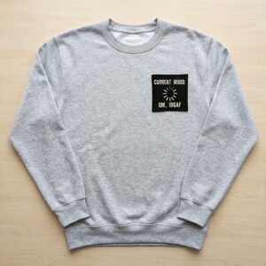 Current mood patch on a grey sweatshirt