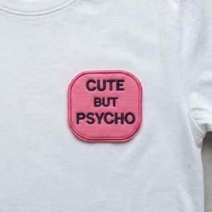 Cute but psycho patch on a white t-shirt