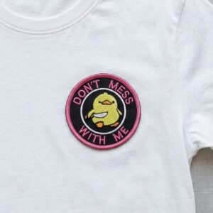 Duck with knife patch on a white t-shirt